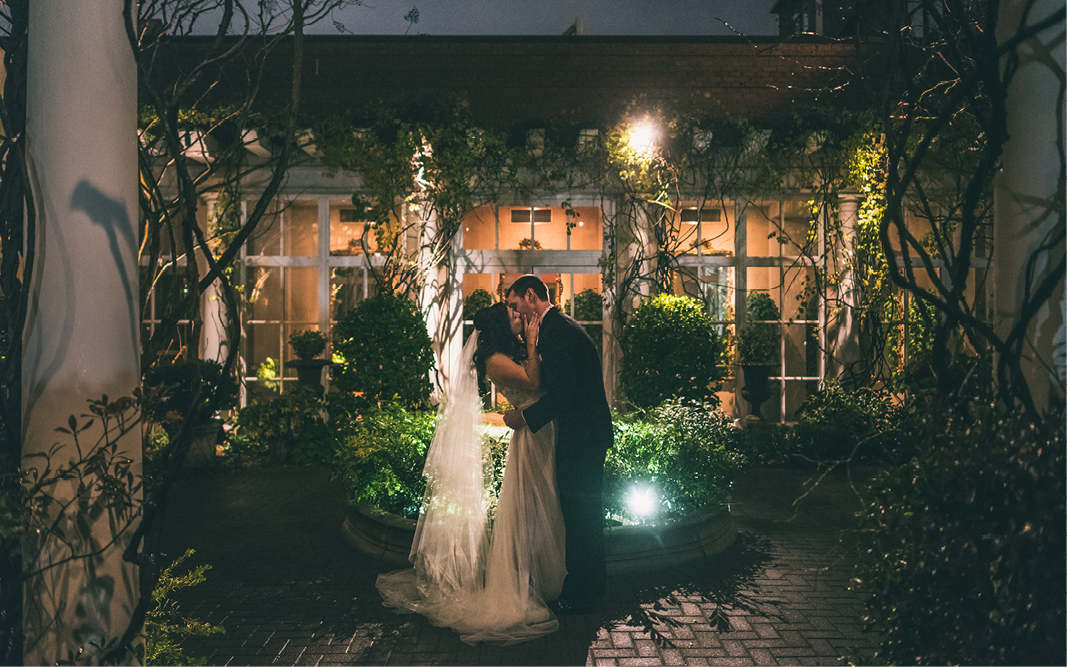 O.Henry Hotel Weddings - Andrea and Kevin kissing