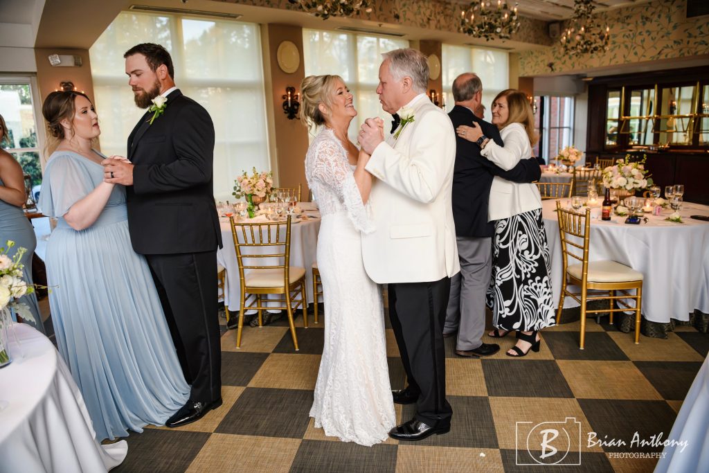 Photo of Bride and Groom's first dance- The Butterfly Waltz, symbolizing transformation, re-birth, joy, and hope. Photo by Brian Anthony Photography.