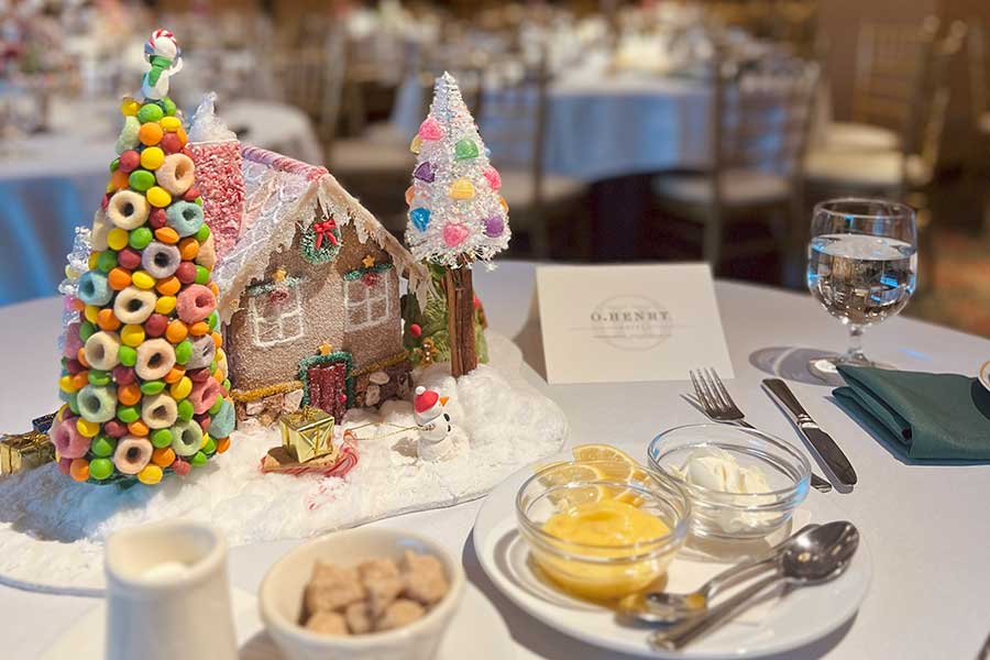 Holiday-Nutcracker-Tea-2023 Whimsical table Setting with Gingerbread house at O.Henry Hotel's annual Nutcracker Tea.