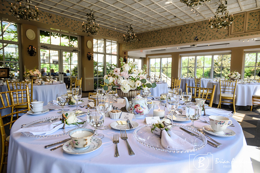 O.Henry Hotel Pavilion by Brian Anthony Photography - Our peaceful oasis of an outdoor room is surrounded by flowering trees and vines. The Don Rives Cloister Garden adjoins our orangery-style Pavilion, a sunny window-enclosed room. The two areas can be combined and used for a cocktail party and dinner or a wedding and reception of up to 40 seated guests and 50 at a standing reception. The garden also adjoins the Social Lobby.