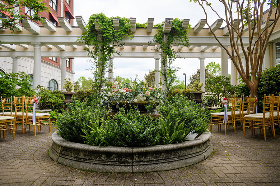 Cloister Garden Wedding, Theatre Set Cloister Garden Wedding, Theatre Set The Don Rives Cloister Garden can seat 50 guests in theatre style seating. The garden is named after Quaintance-Weaver's late great friend and Minister of Design, Don Rives.
