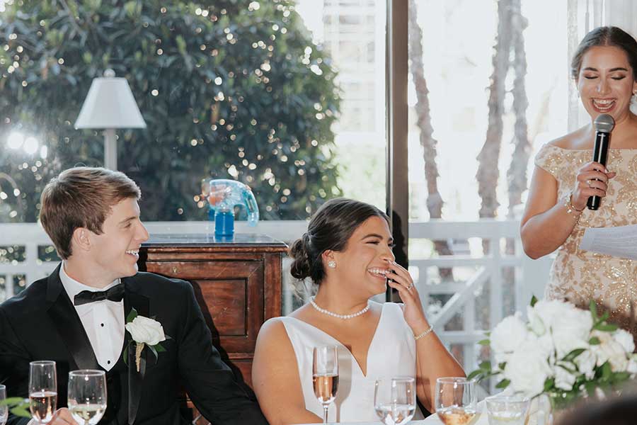 Guests sharing stories and providing toasts