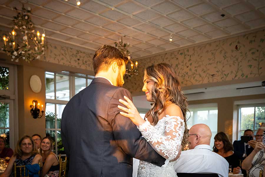 First Dance | Micciche Photography The sun sets as Alex and Seth share their first dance.