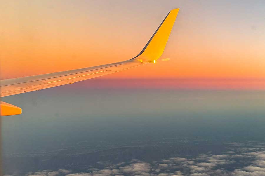 sunset view from an airplane window seat.