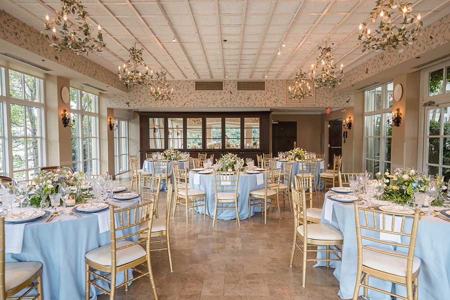 Pavilion set with five round tables of eight. | Photo by In His Image Photography