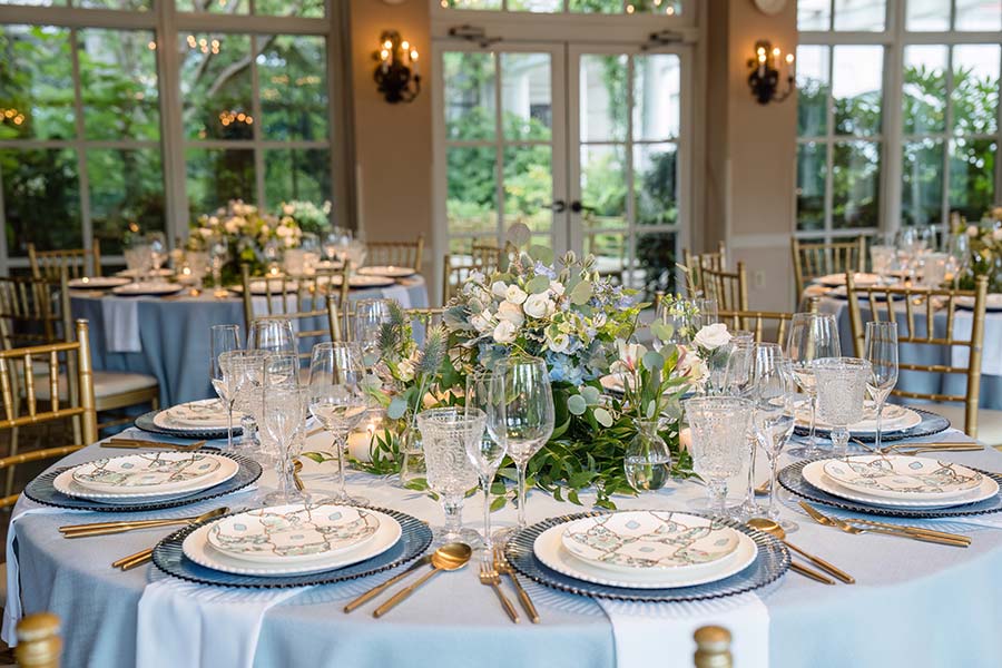 Featured in MarryMeNC, a spring wedding styled in dusty blue, in the Pavilion at O.Henry Hotel.