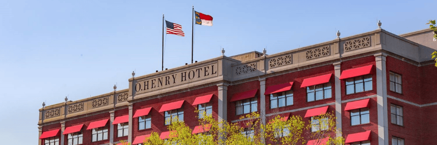 O.Henry Hotel Upper Facade with Flags flying
