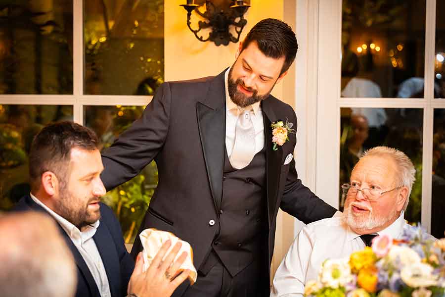 Connecting with Guests | Micciche Photography Seth connects with guests.