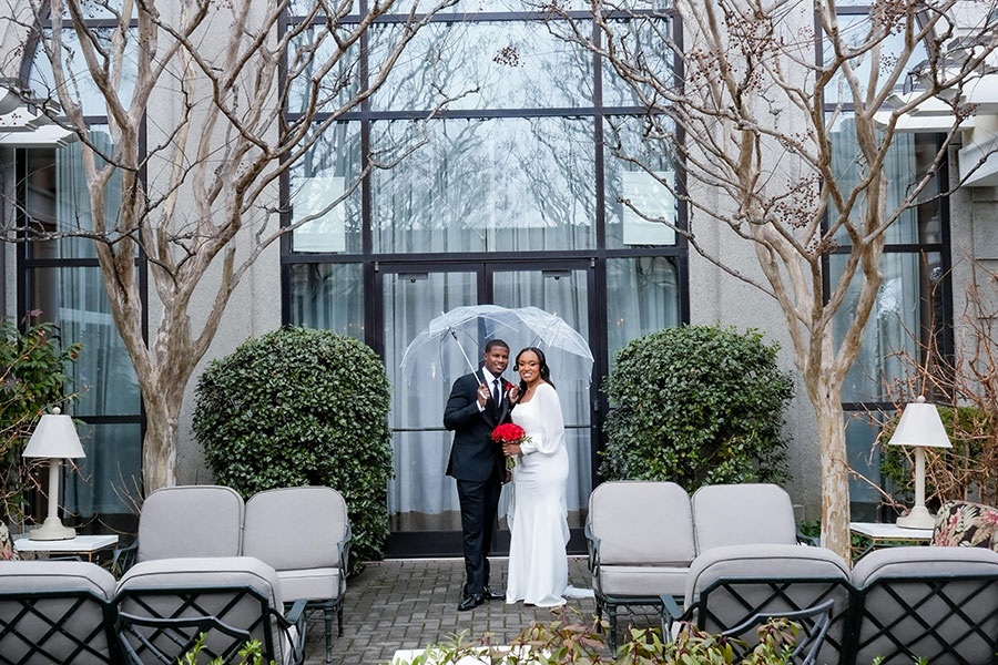Latisha & Ronald | Still Shots Photography Latisha and Ronald pose for a photo as the newly married couple, Mr. and Mrs. Johnson. Married in the Pavilion Room at O.Henry Hotel.