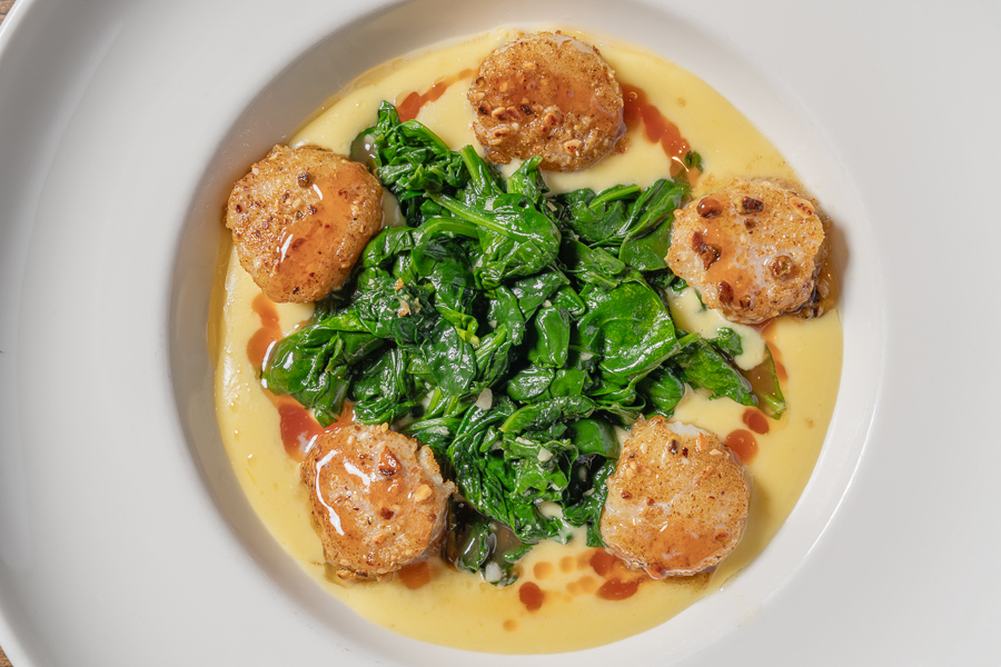 Pan-Seared Scallops, pistachio-dukkah dusted charred blood orange brown butter, saffron-fennel purée, wilted greens