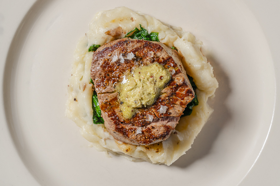 Wood-Fire Grilled Filet Mignon Wood-Fire Grilled Filet Mignon*, za’atar salsa verde butter, mashed potatoes, wilted greens